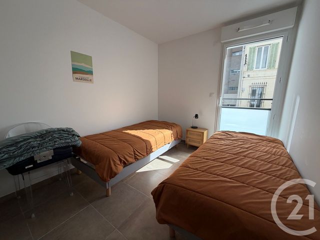 Afficher la photo en grand Appartement à louer - 3 pièces - 58.89 m2 - MARSEILLE - 13006 - PROVENCE-ALPES-COTE-D-AZUR - Century 21 Immo-Conseil